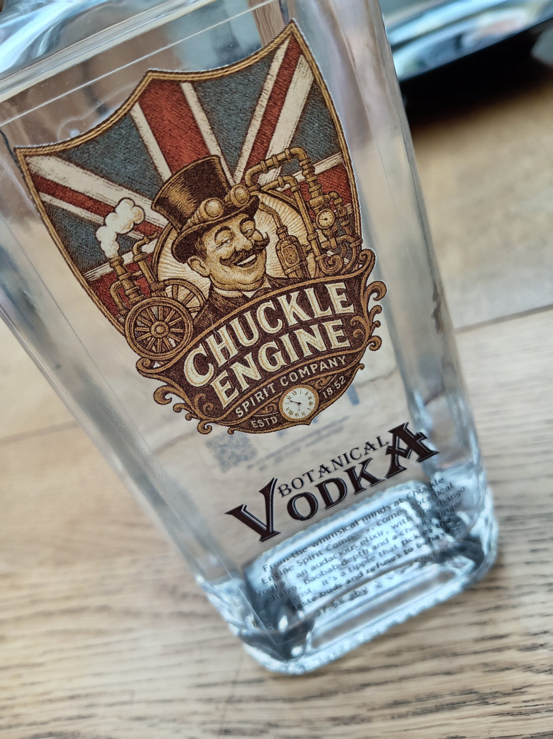 Close-up of a Chuckle Engine Spirit Company vodka bottle, a handcrafted small-batch British spirit